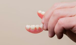 How Long Do Dentures Last? Lifespan & Care Tips